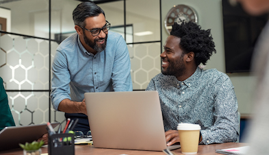 Creative professionals collaborating in conference room