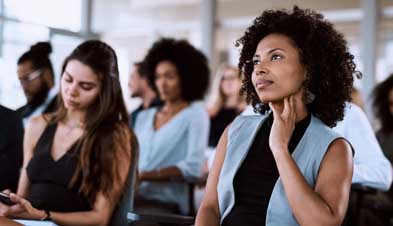 Professionals listening to a talk